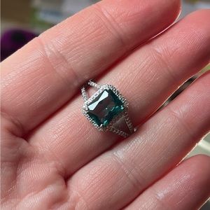 Size 9. Lab created Smokey spinel on rhodium plating. SRP $116